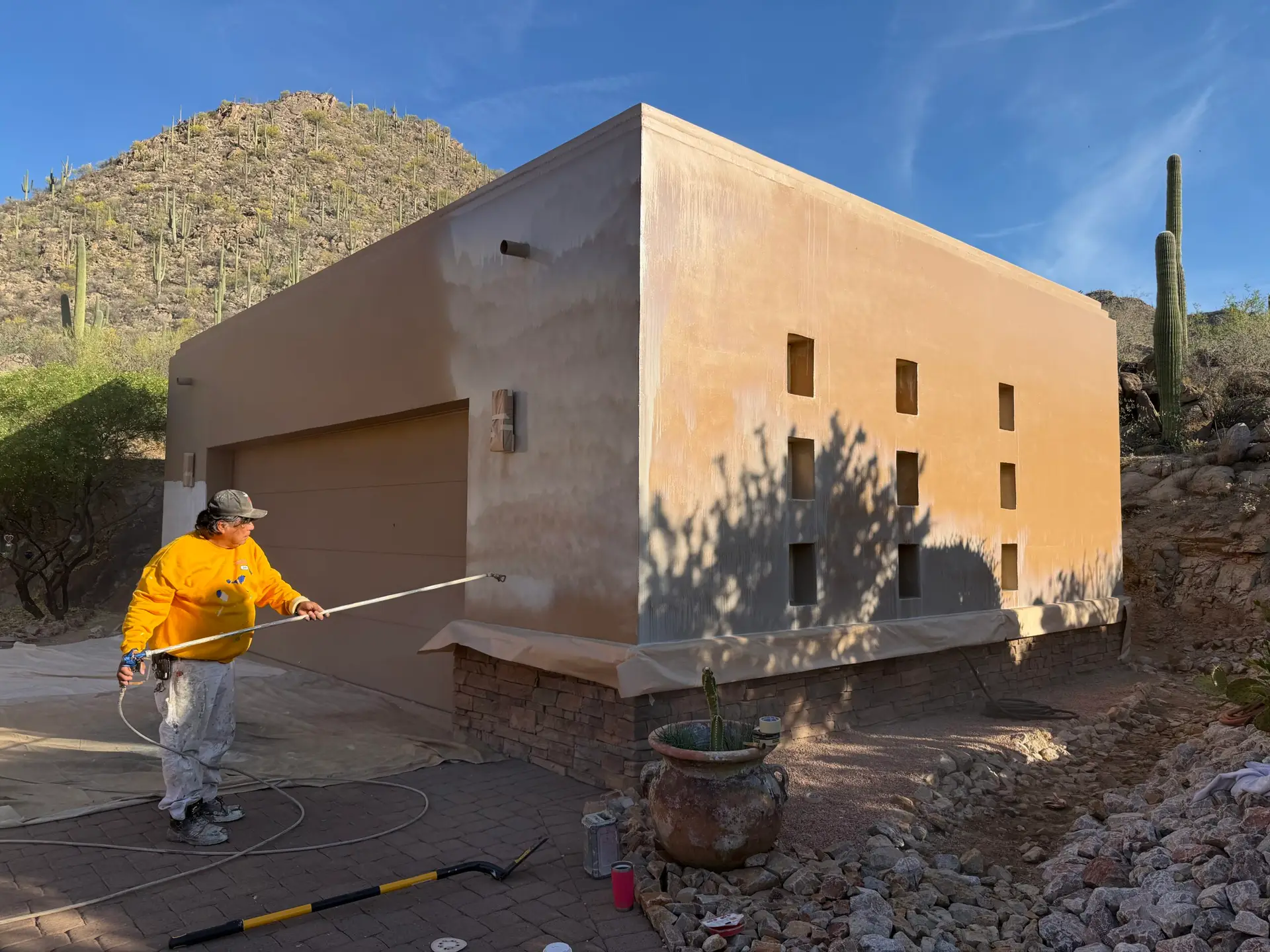 Spraying Sherwin-Williams Loxon