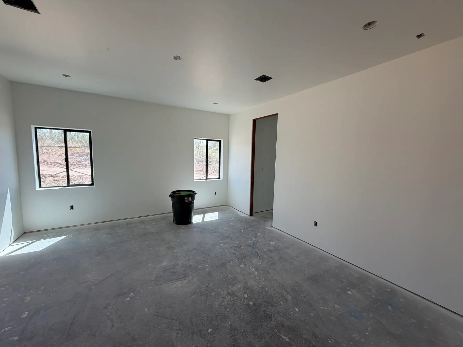 After completing all the ceilings, & one coat on the walls
