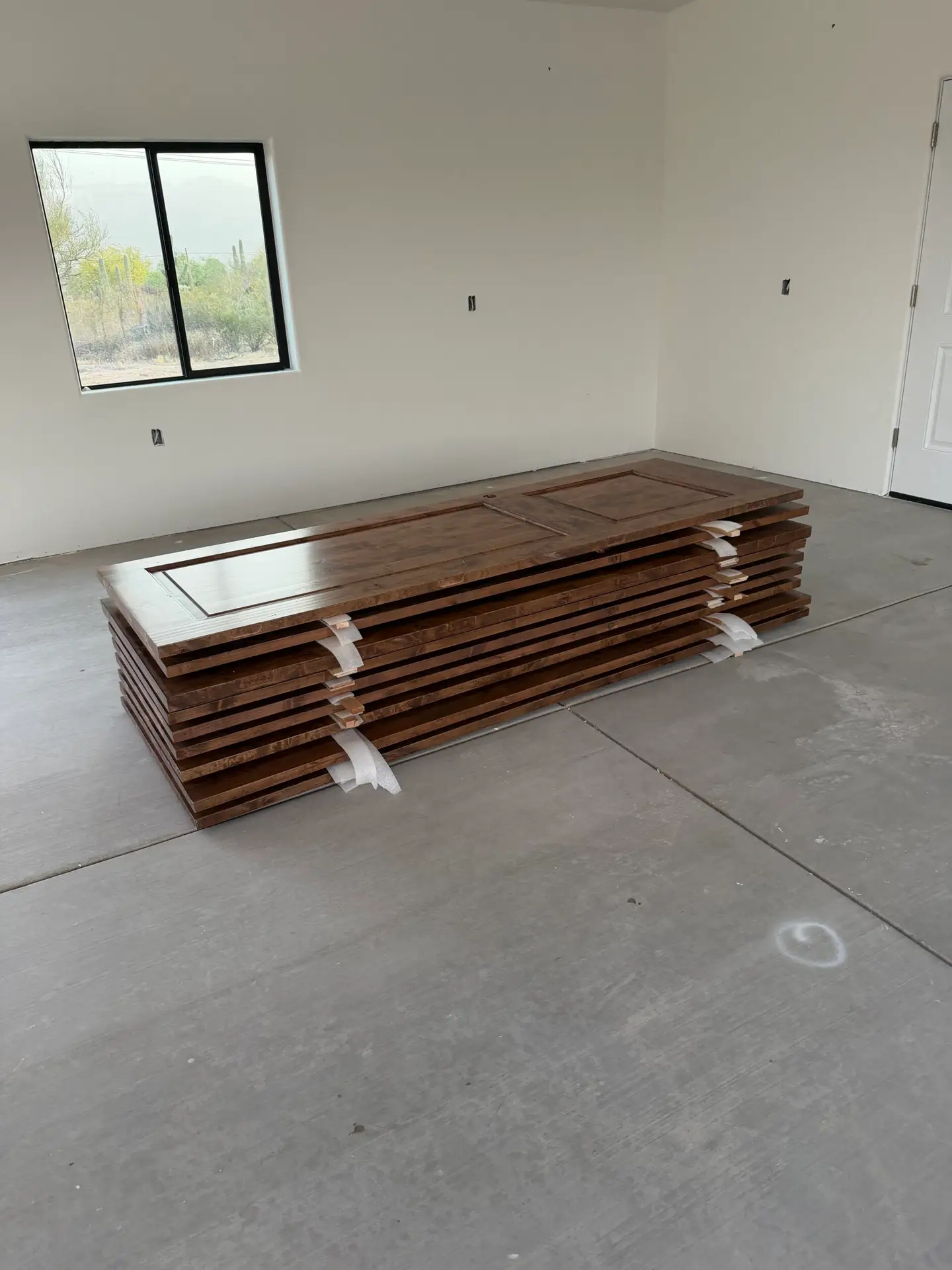 Stacking doors for them to go up once tile gets installed