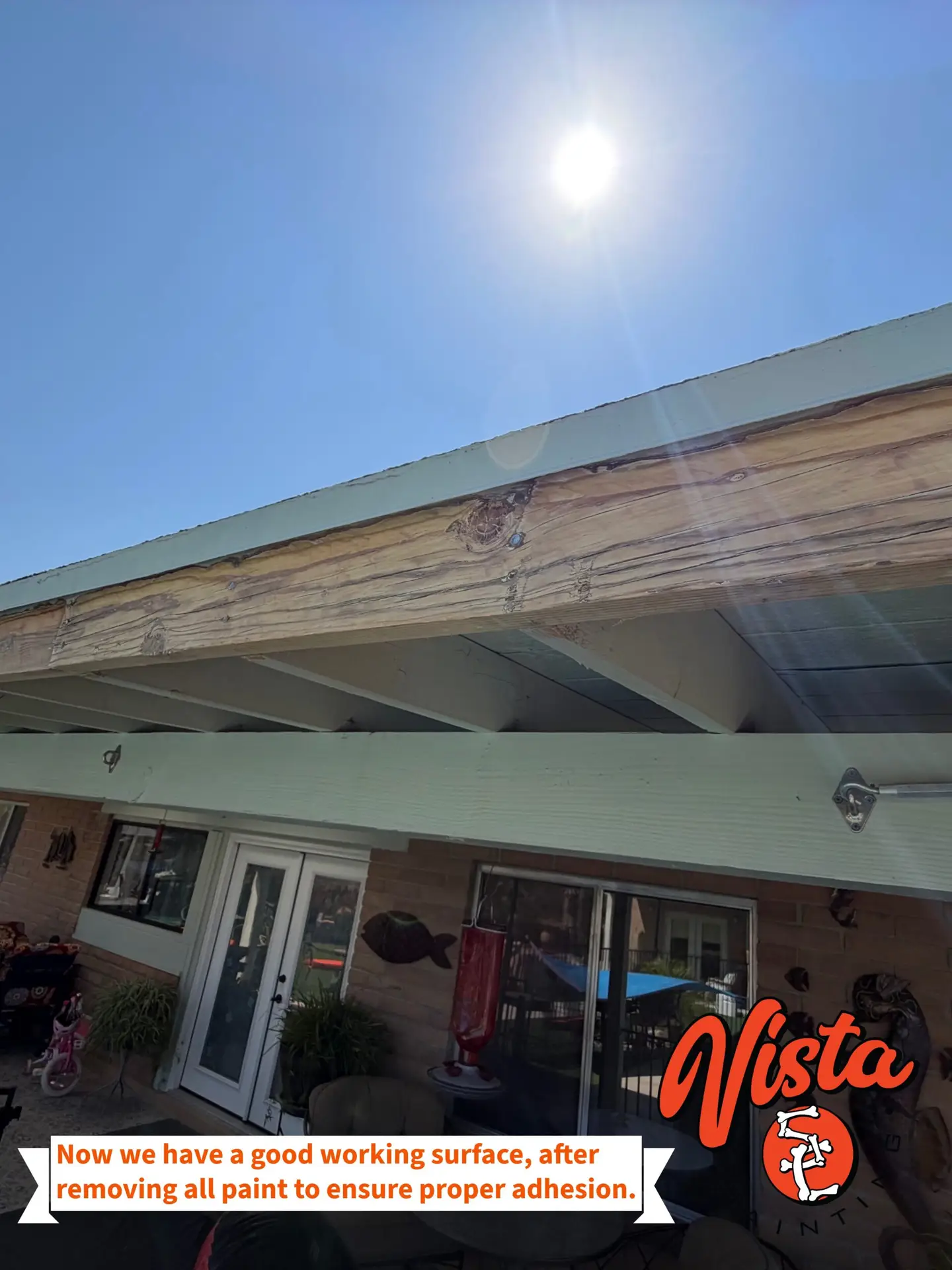 Bare wood fascia after removal of loose and failing exterior paint in Tucson