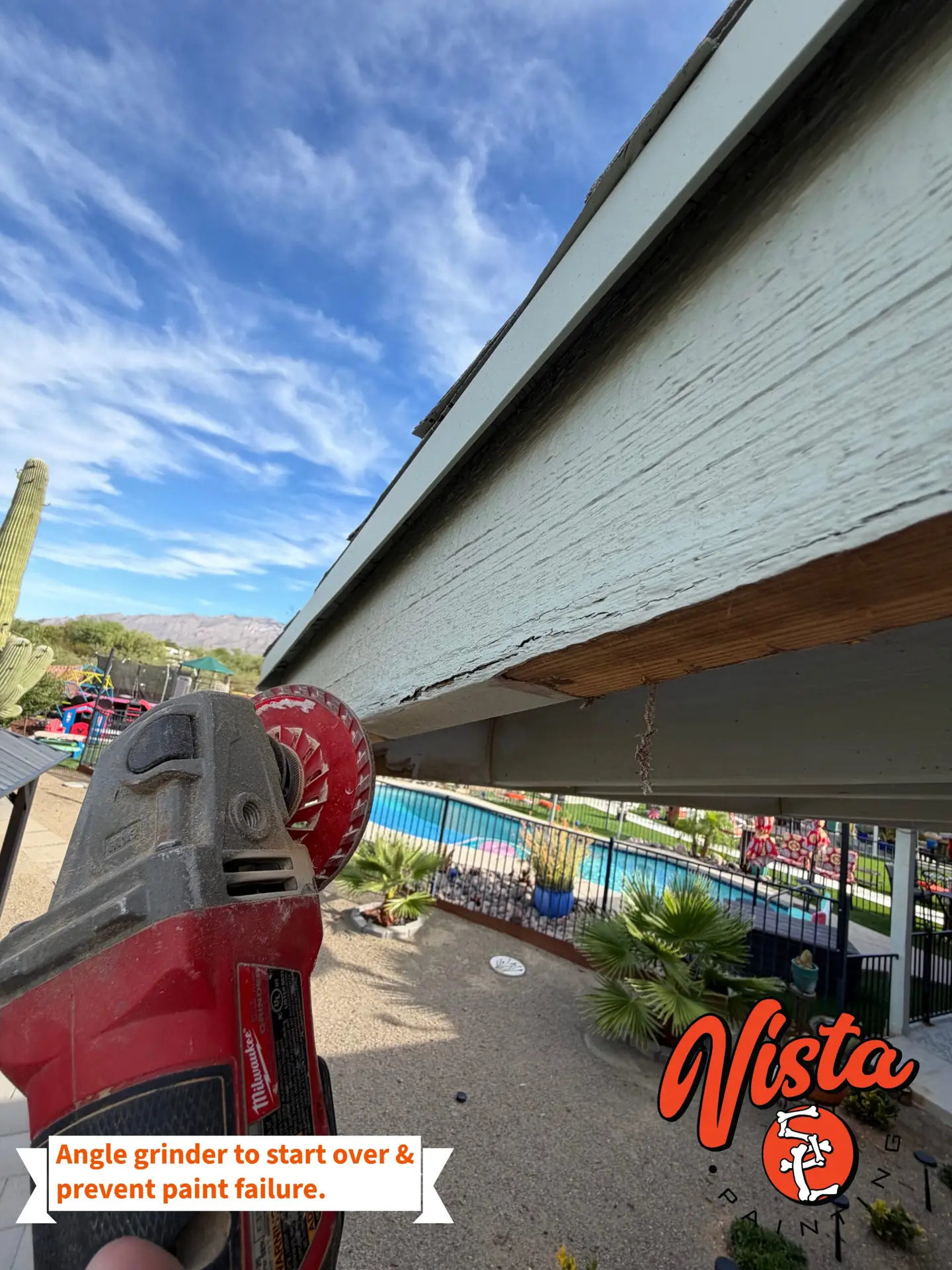 Exterior wood fascia paint removal using an angle grinder in Tucson